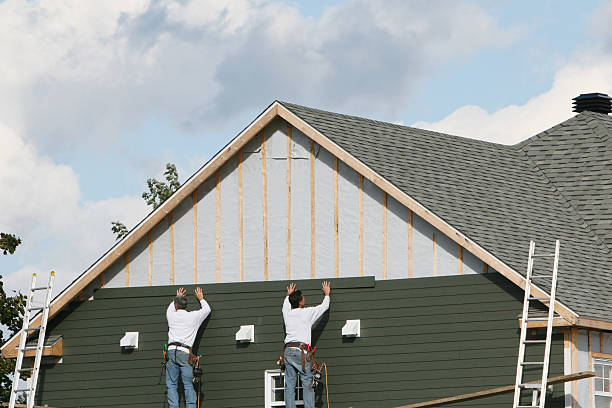 Professional Siding technician working in Farmville, VA